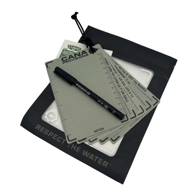 CANA Water Data Card Core Kit flat-lay, fanned gray dot-grid cards, black Staedtler pen and RESPECT THE WATER pouch