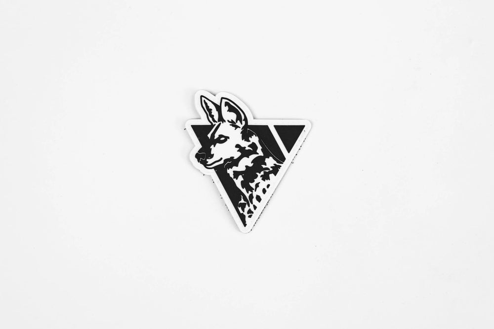 Dirty Civilian Logo Patch in black and white PVC, front view with wild dog head inside an inverted triangle
