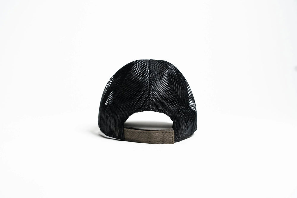 Team Cap rear view showing black mesh back panel and olive velcro adjustable closure strap on white studio background