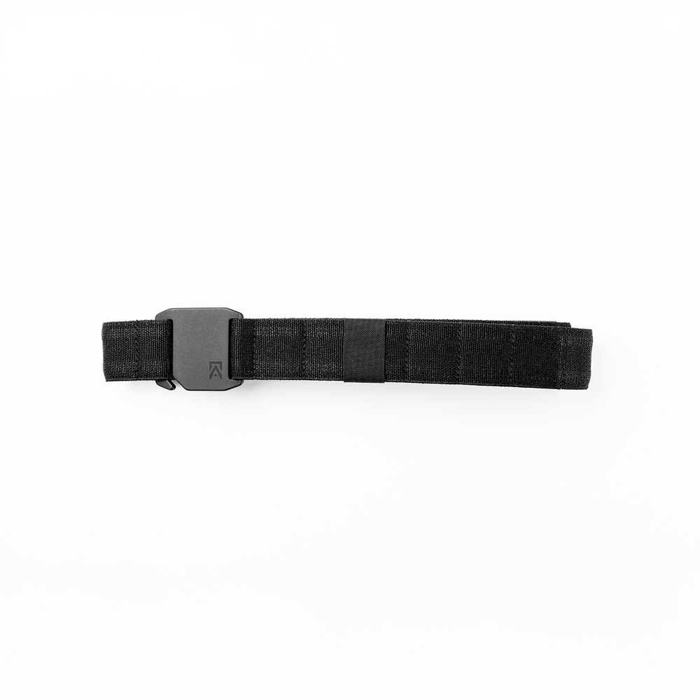 Agonic Every Day Belt in black nylon webbing, flat-lay studio shot with matte black aluminum buckle bearing the logo